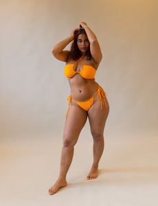 orange bikini on model