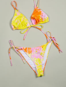 Product picture of a triangle bikini in yellow, pink and orange print